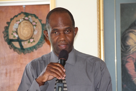 Permanent Secretary in the Ministry of Trade Mr. Dwight Morton addressing participants at an Industrial Sewing Workshop hosted by the Small Enterprise Development Unit in the Ministry of Trade on Nevis